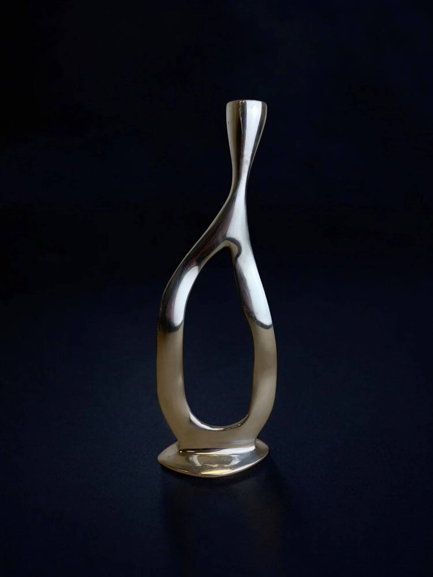 Biomorphic candleholder, solid aluminium, Spain, circa 1970