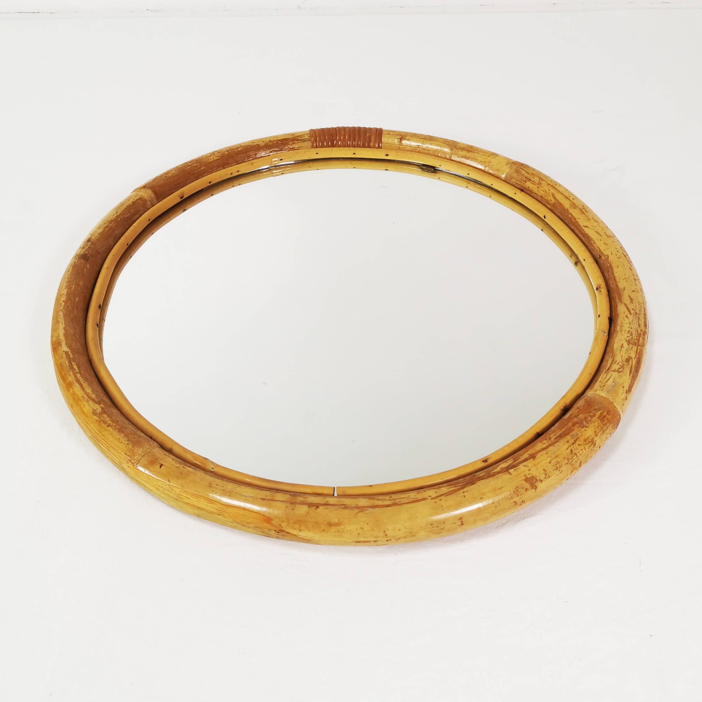 Wall-mounted, round bamboo mirror, Germany, 1970s.
