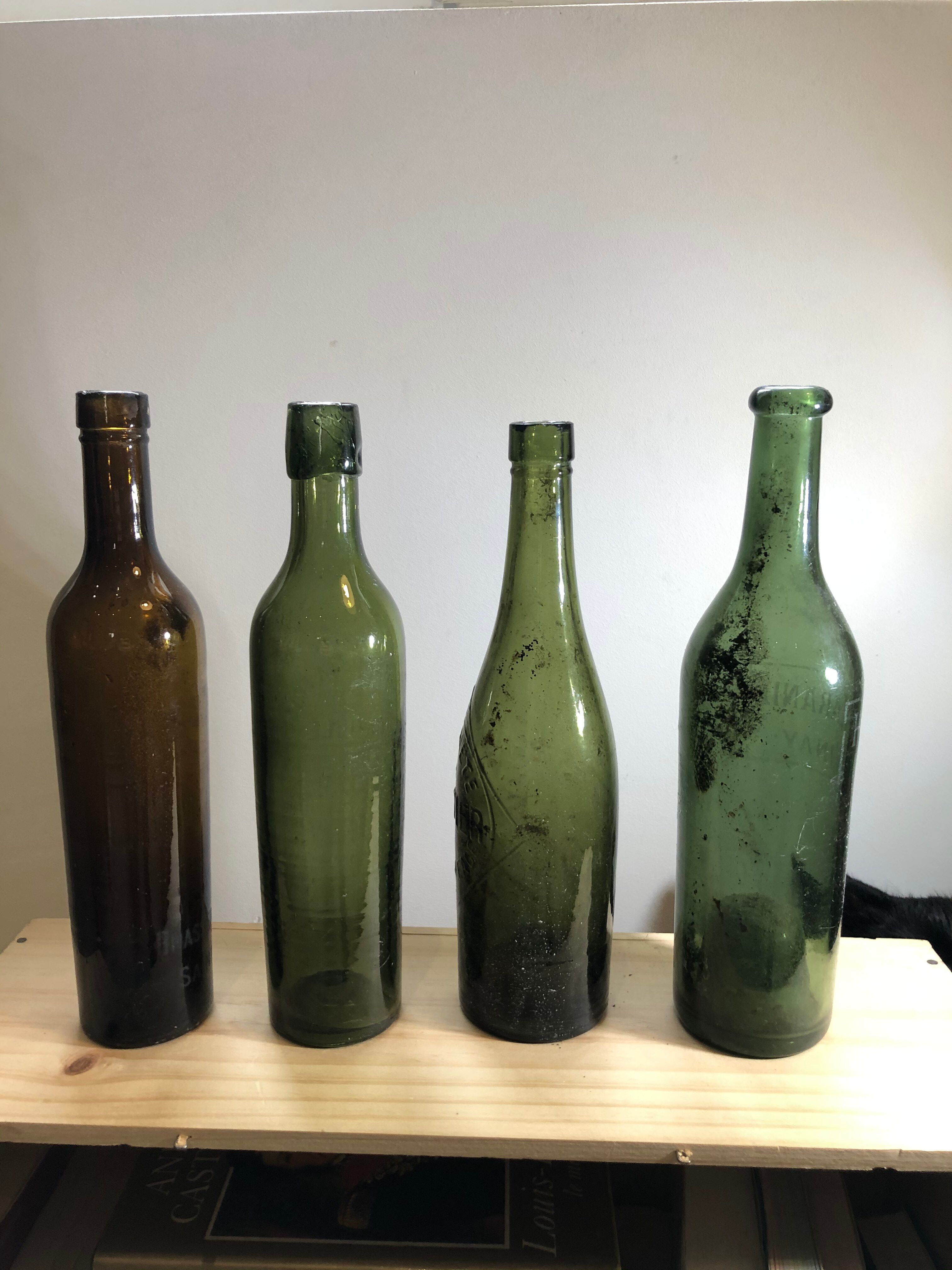 Lot of old blown glass beer bottles with marking