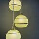 Suspension triple vintage glass globes in frosted green and gold.