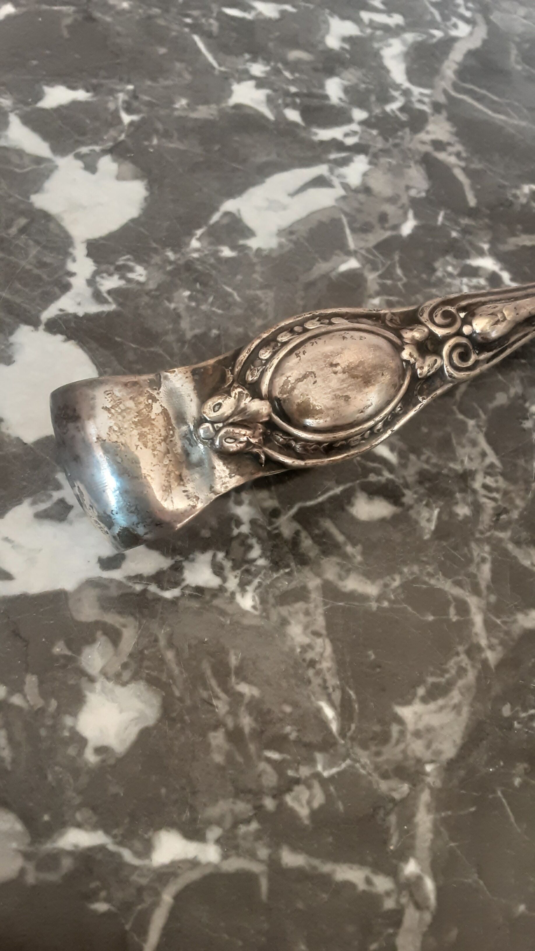 Antique silver metal sugar clamp