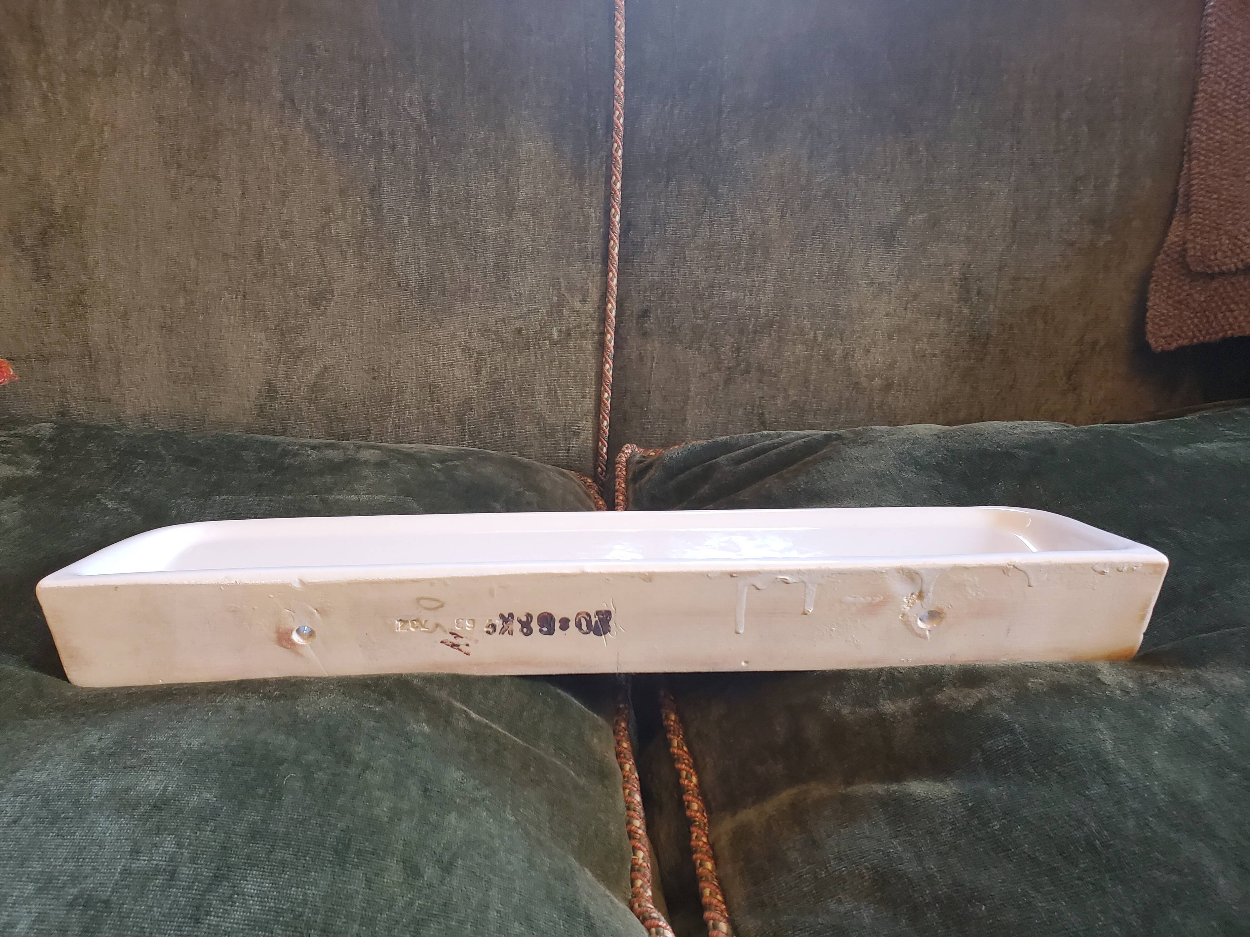White ceramic bathroom shelf