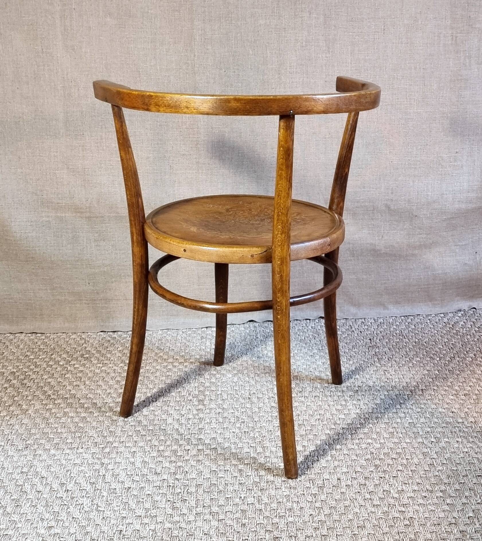 Early 20th century curved wooden office chair