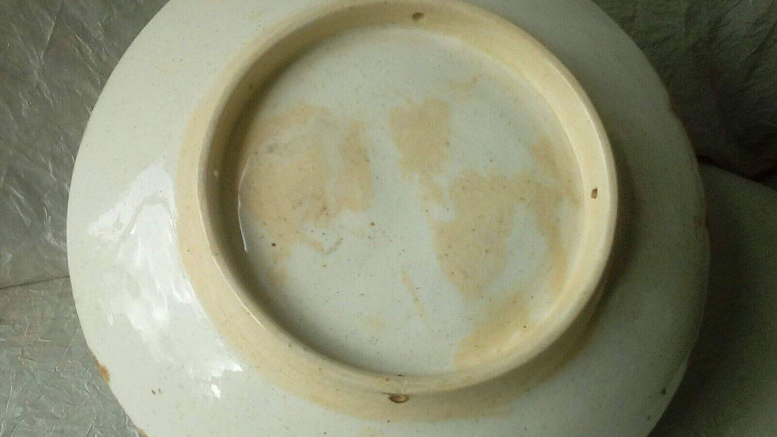 Ceramic plate barbotine trome eye plum late 19th