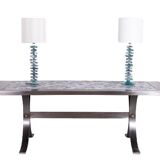 Polished metal and ceramic dining table. 1970s.