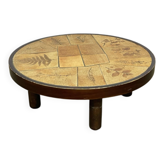 Beech coffee table with a ceramic top featuring a herbarium design.