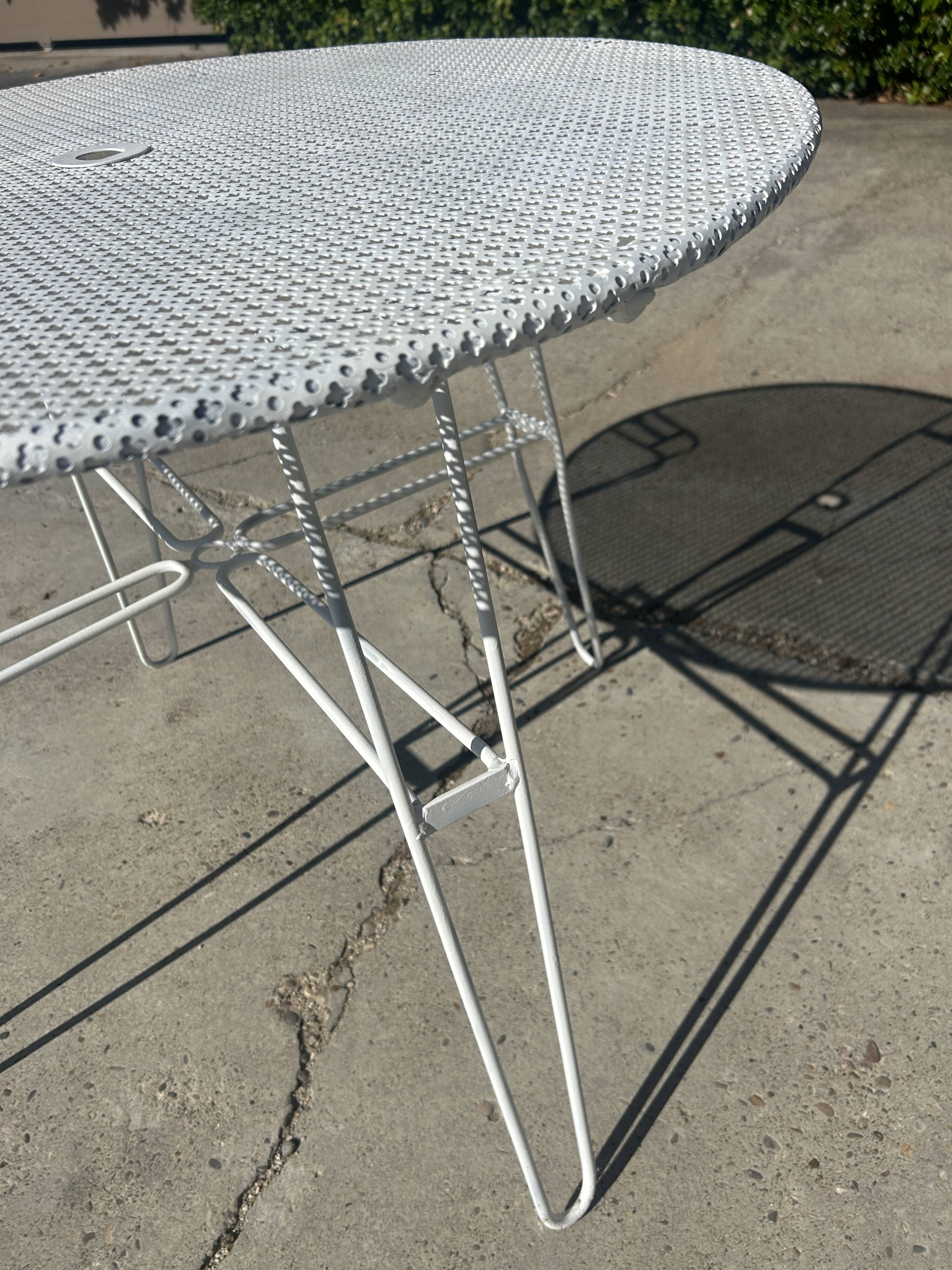 Garden table attributed to Mathieu Mategot from the 1950s.