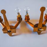 Pair of two-armed art deco "ball" wall lights, carved wood, France, 1960