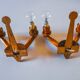 Pair of two-armed art deco "ball" wall lights, carved wood, France, 1960