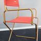 Fauteuil pliant avec accotoirs Lafuma rouge et or 1970