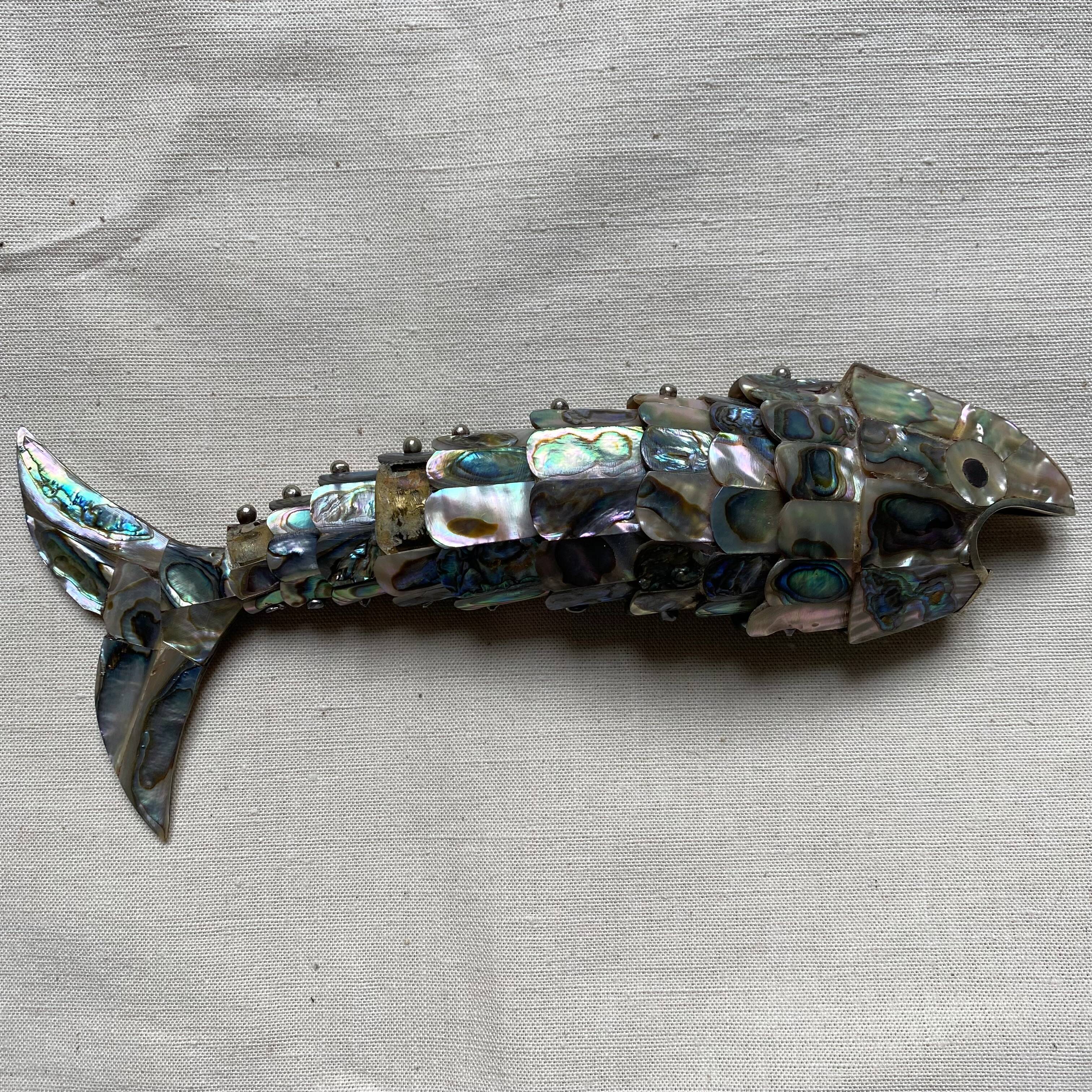 Fish-shaped bottle opener made of seashell and brass, 1970s