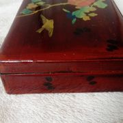 Old lacquered wooden box with china or japan decoration, bird and flower