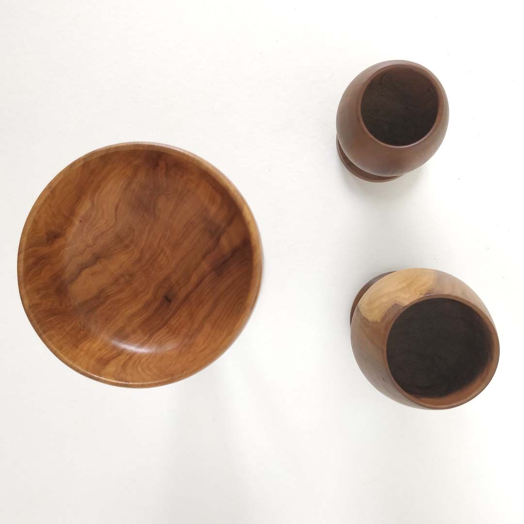 Trio of egg cup glasses and Scandinavian wooden cup