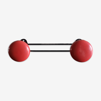 Metal coat rack with 2 red hooks