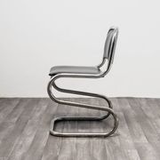 Ensemble de 4 chaises à bascule en acier chromé design années 80 vintage moderne.