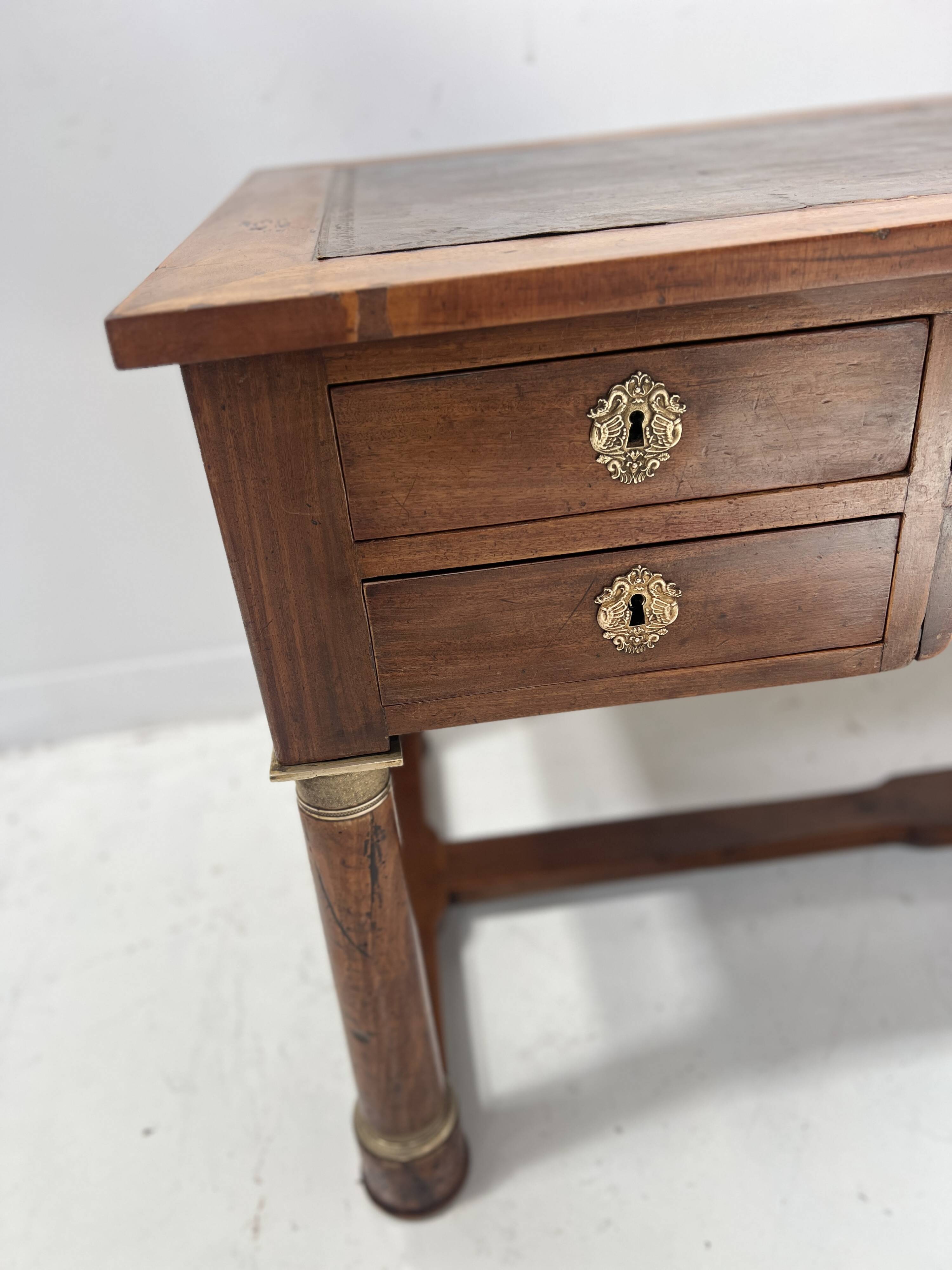 Empire style desk in mahogany and veneer, 19th century.