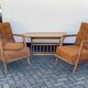 Trio of Knoll Lounge Chairs with Magazine Table.