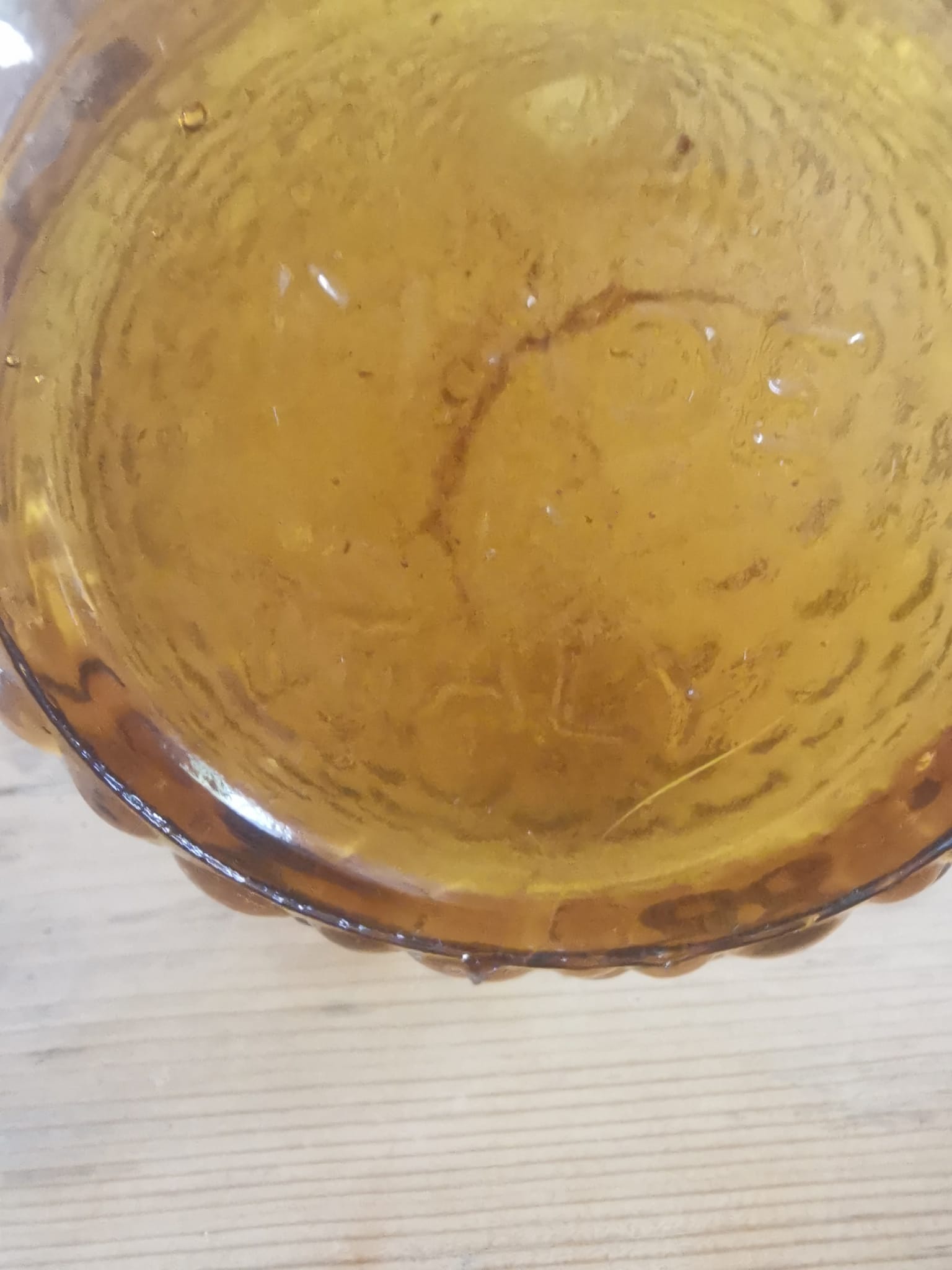 Amber-colored empoli glass decanter