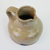Flat jug in heavy beige stoneware