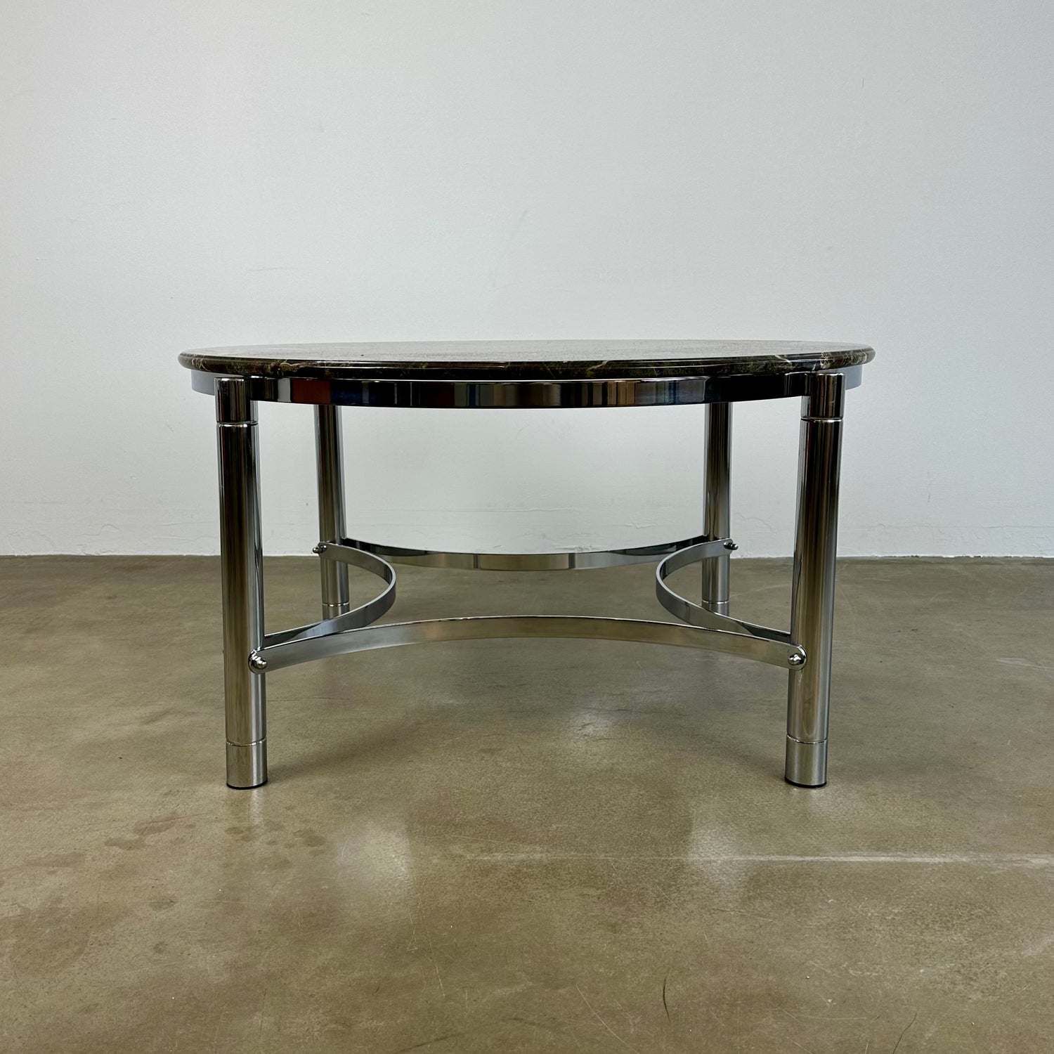 Coffee table with marble top and chrome base
