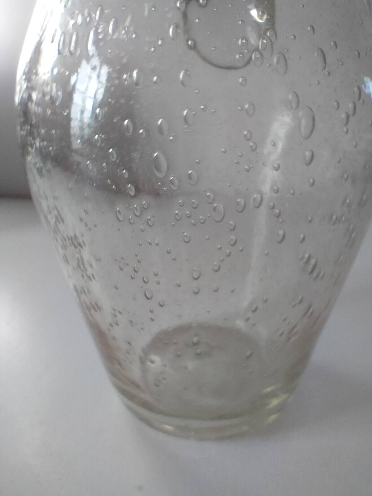 Bubble glass carafe bottle signed Biot in lime green colour.