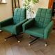 Paire de chaises pivotantes rétro sur roulettes