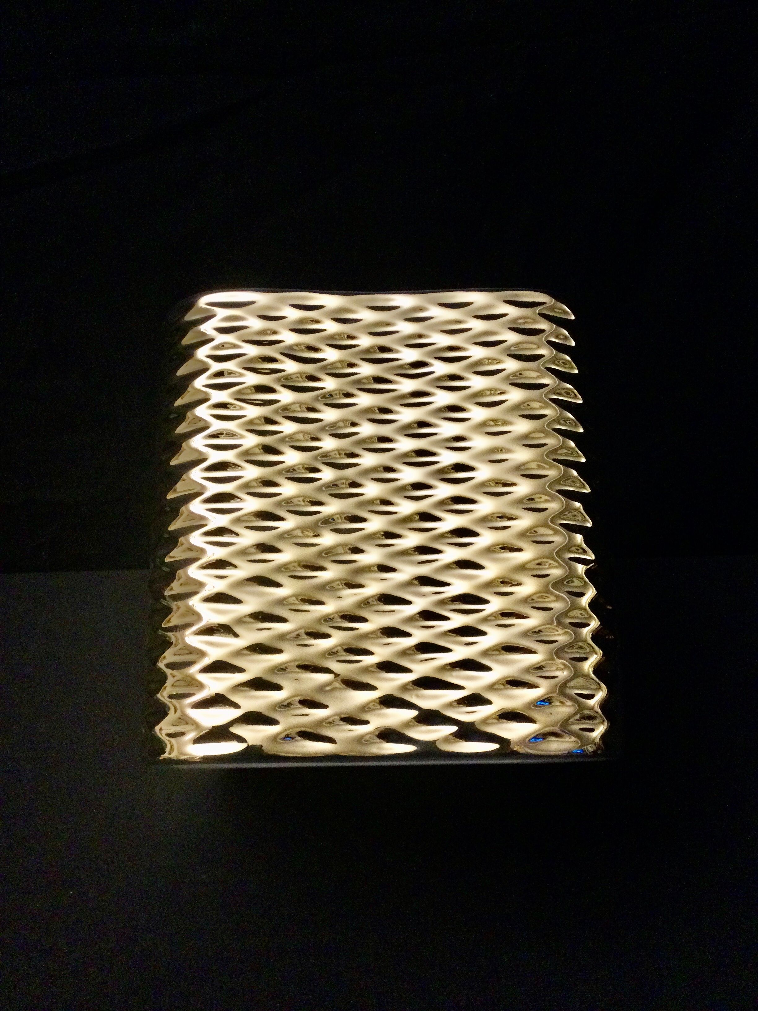 Golden ceramic cube wall light