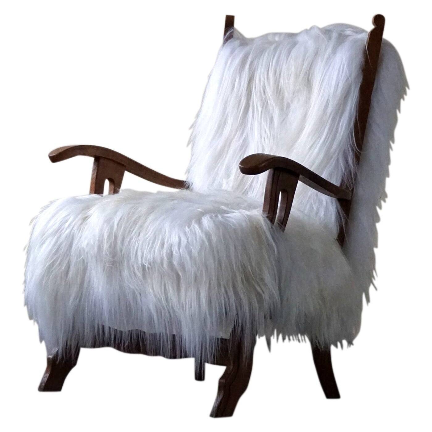 Henning Kjærnulf, armchair reupholstered in long-haired Icelandic sheepskin, 1950