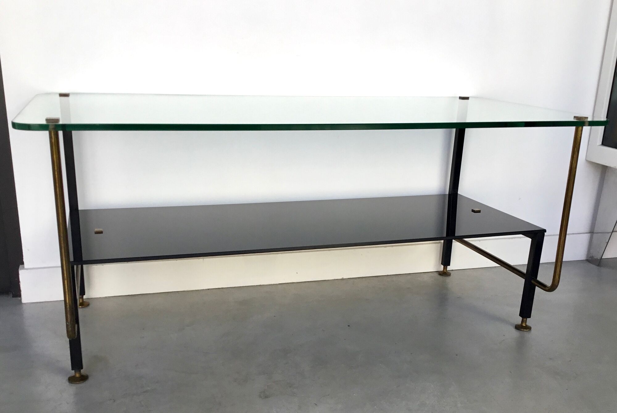 Modernist coffee table in metal tubular base and glass top 1950