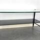 Modernist coffee table in metal tubular base and glass top 1950