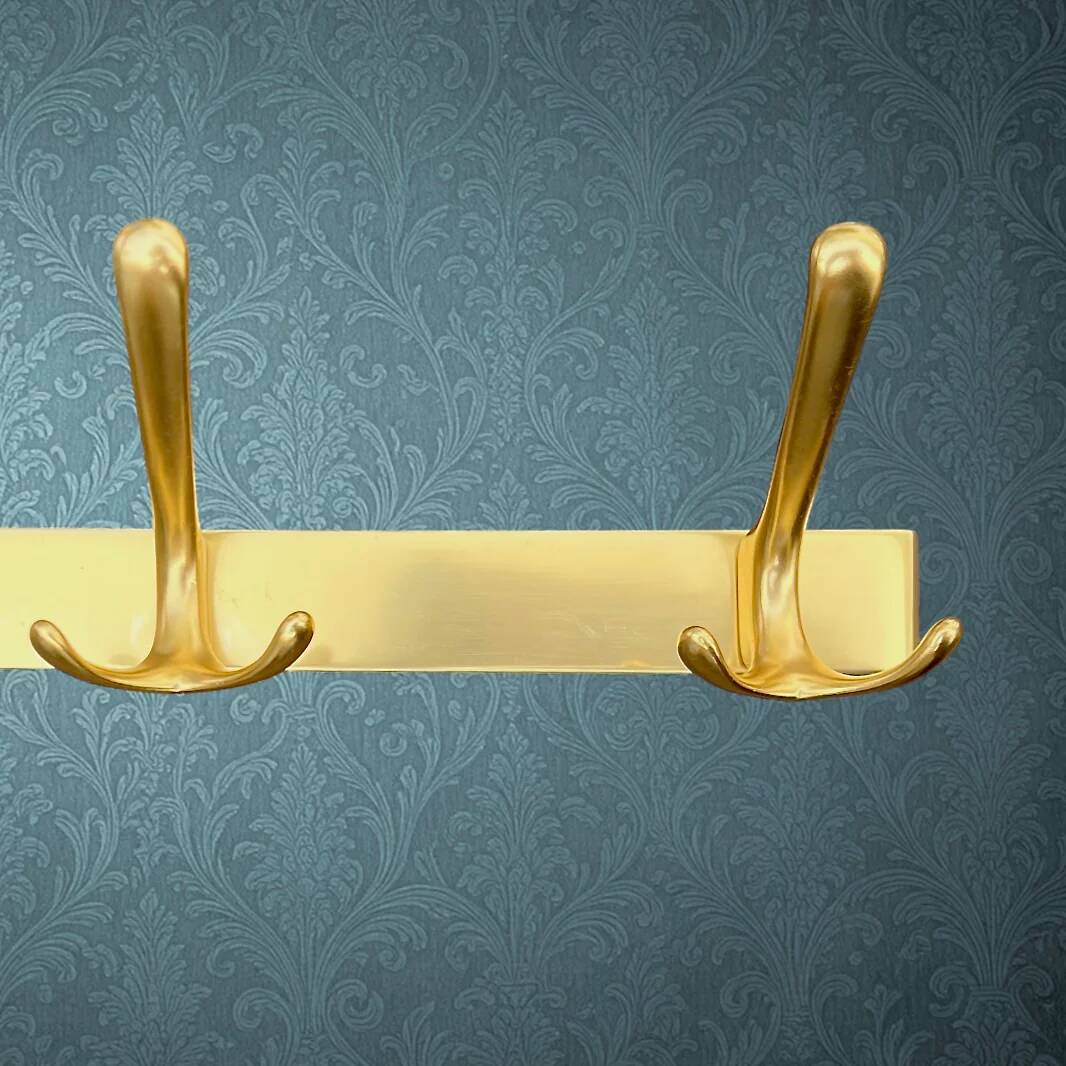 Vintage wall-mounted coat rack in anodised gold aluminium with 3 hooks from the 1970s.