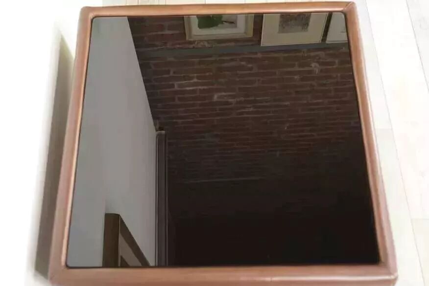 Black leather and glass coffee table