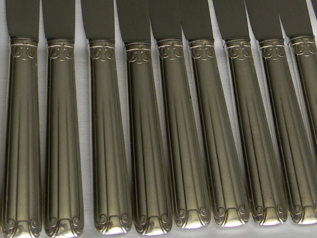 Set of 12 DIXI Art Deco silver metal handle knives.