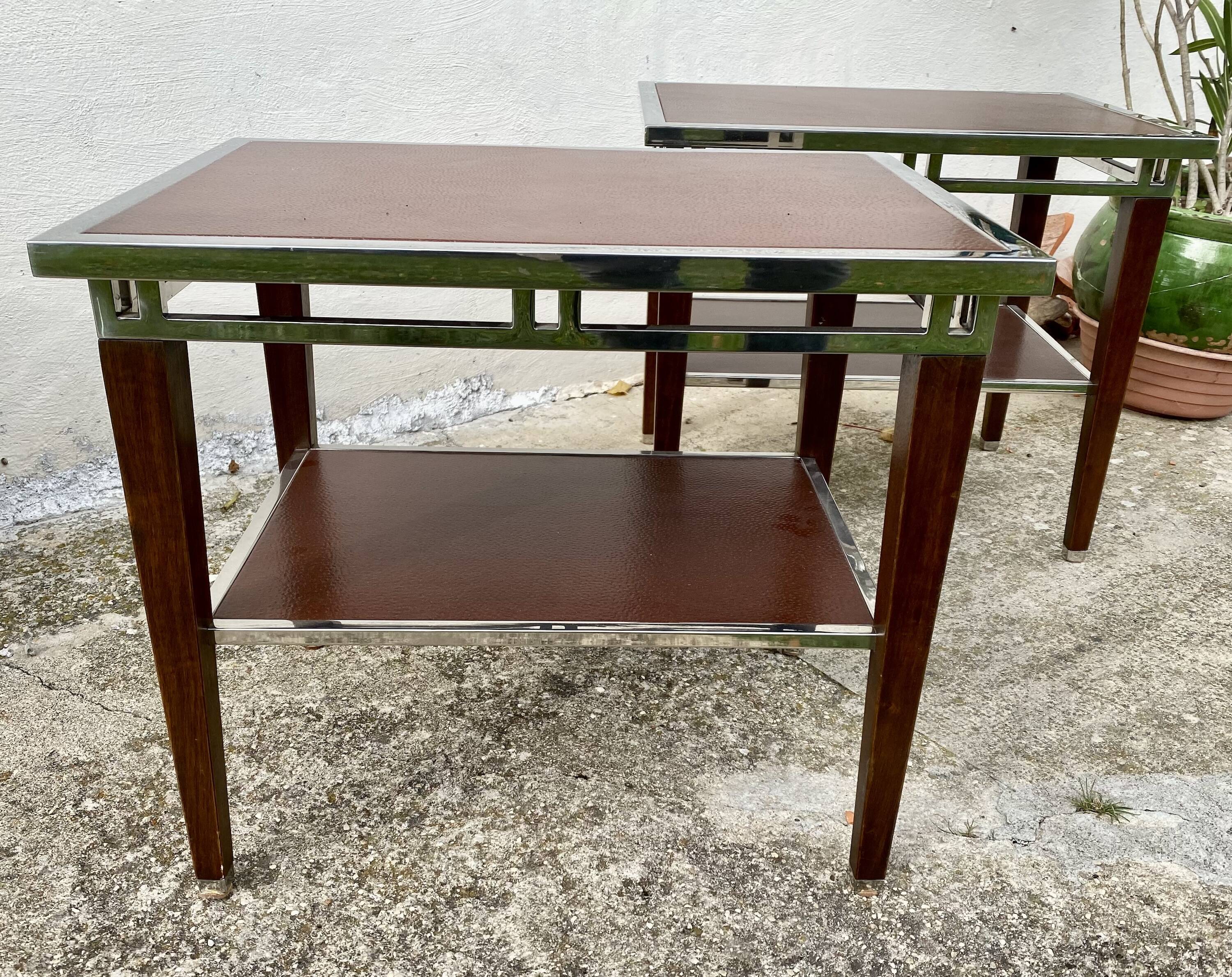 Pair of modernist chrome, leather and wood side tables