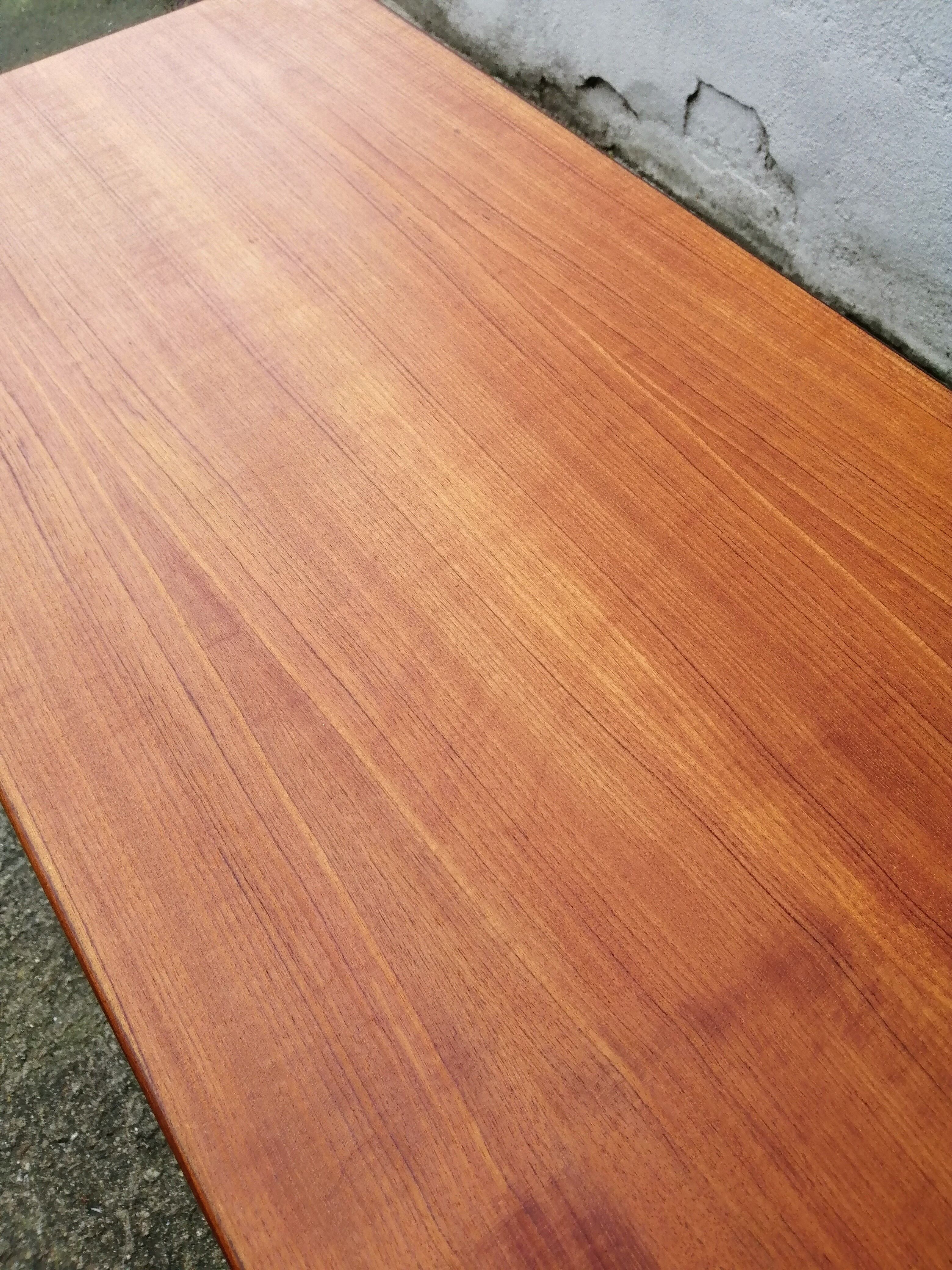 Dining table by Ib Kofod Larsen of the 60s