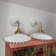 Two wall sconces in serrated white opaline