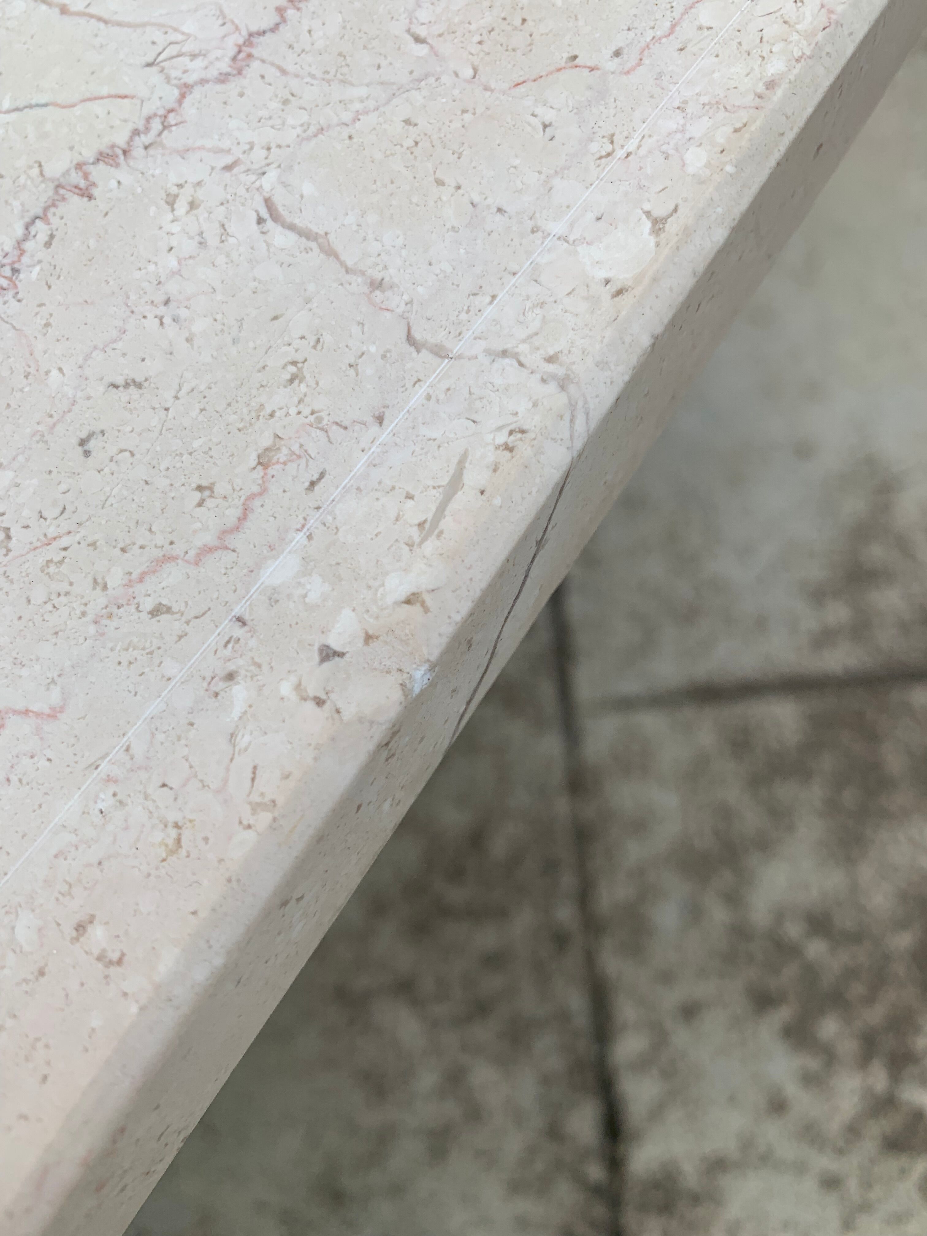 Rectangular travertine coffee table central foot