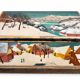 Antique chest hand-painted with a snowy village scene and a starry interior.