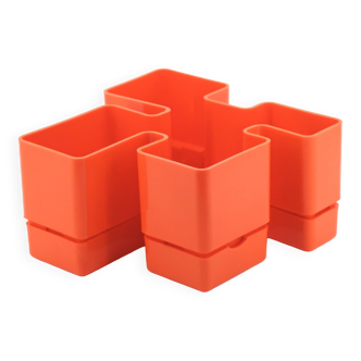 Vastill orange plastic planter by Michael McCann