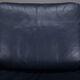 Danish teak and navy blue leather lounge chair from Komfort, 1970s