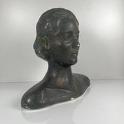 Female bust in neoclassical style in plaster by M. Mongey, 20th century.