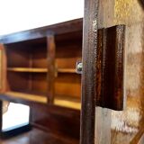 Vintage wooden display cabinet with yellow glass.