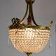 Bronze chandelier and Louis XVI pendants