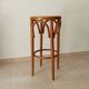 Vintage curved wooden high stool and tanned seat