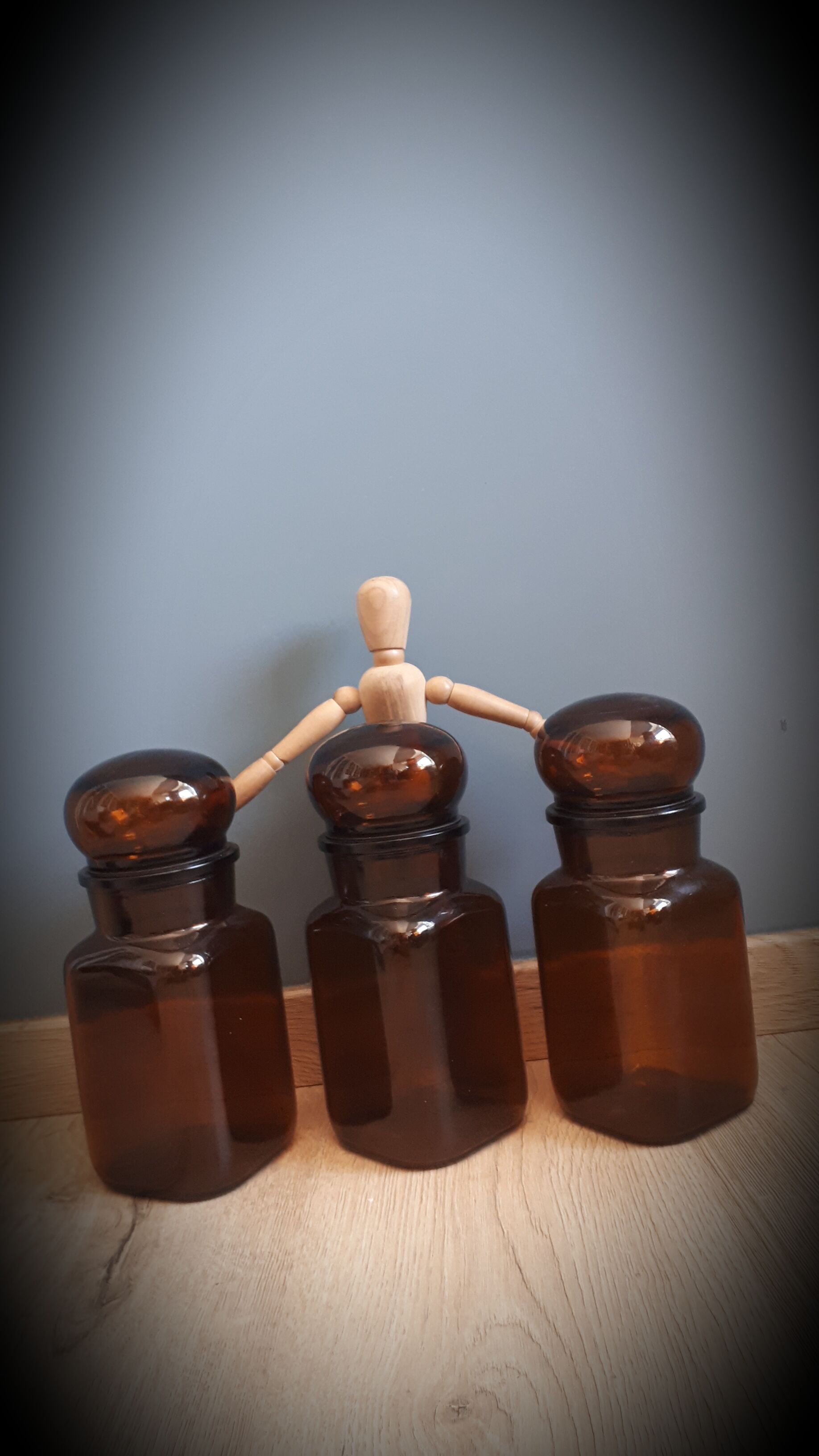 Trio round brown apothecary bottles