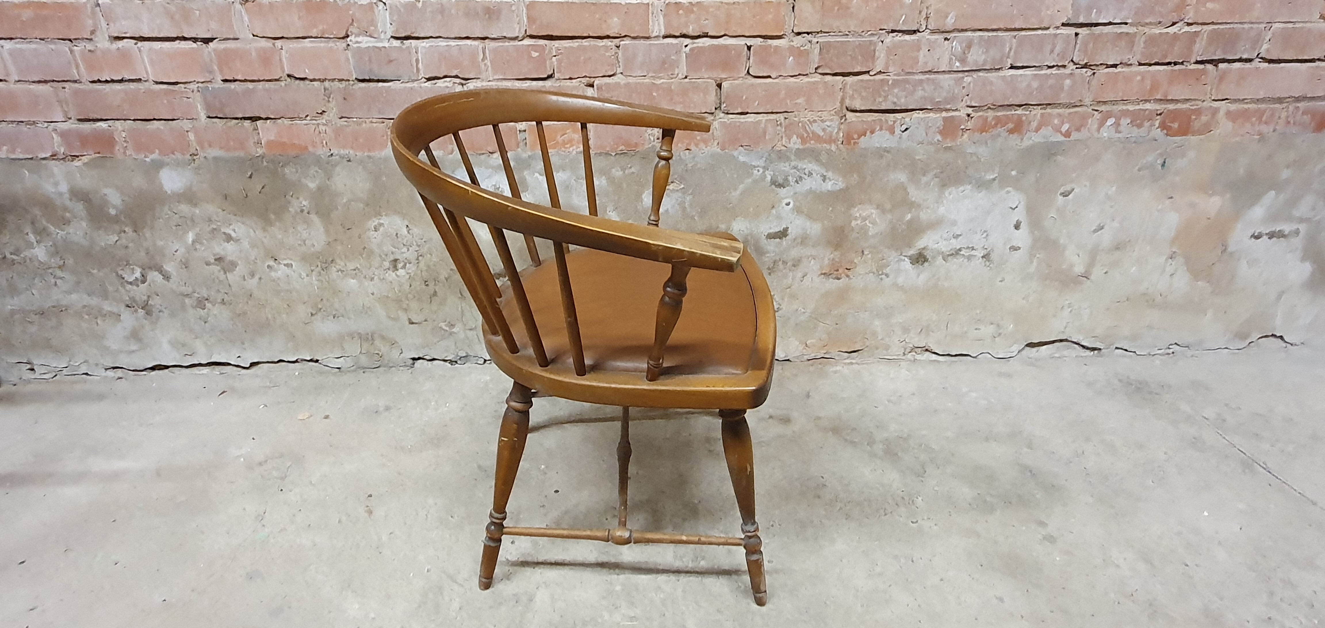 Vintage office armchair with Scandinavian style bar