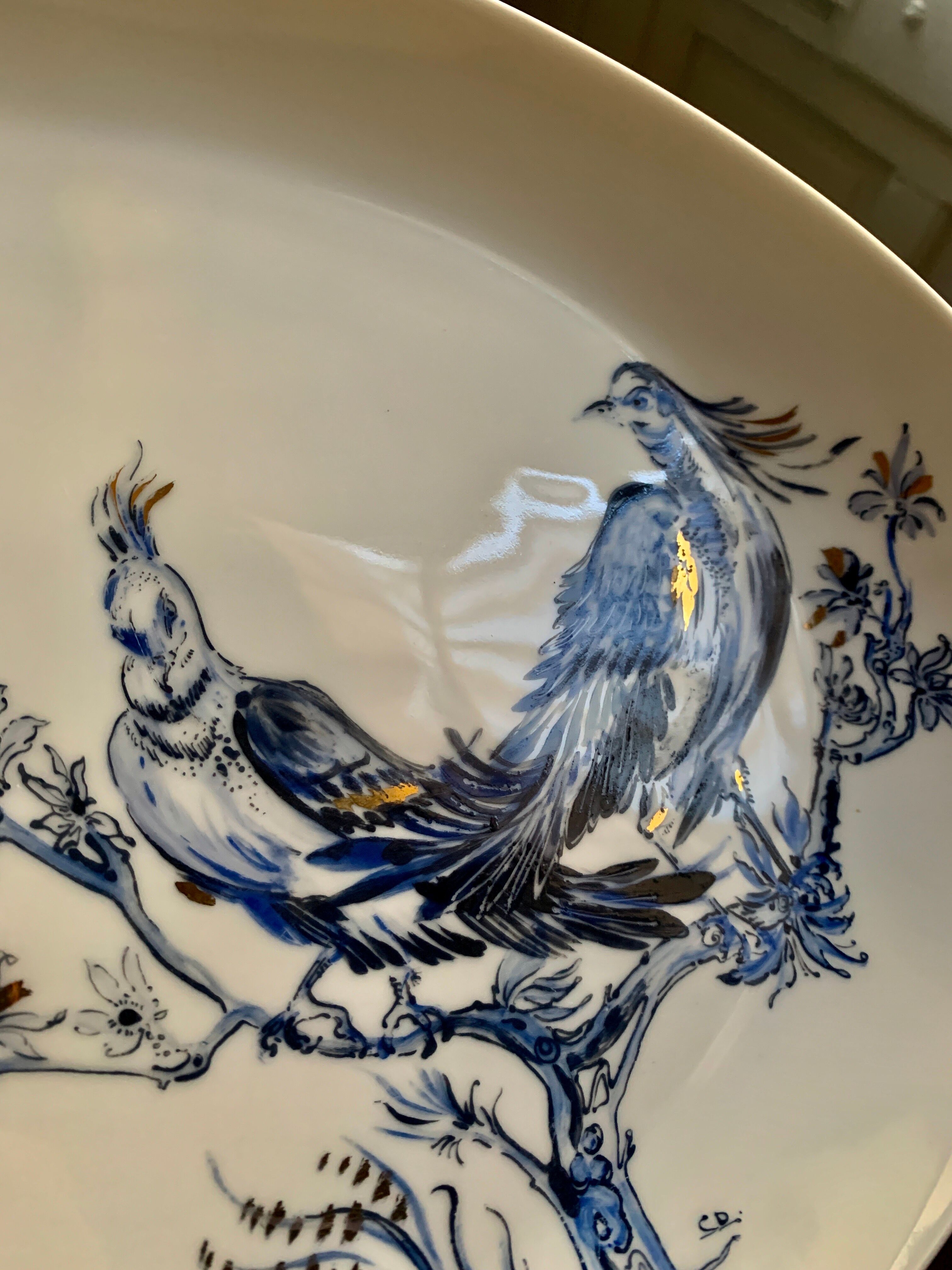 Plate signed Arsberg, "The Buffoon" after a model from the Royal Manufacture of Sèvres.