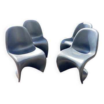 Set of 4 black Verner Panton Vitra chairs.