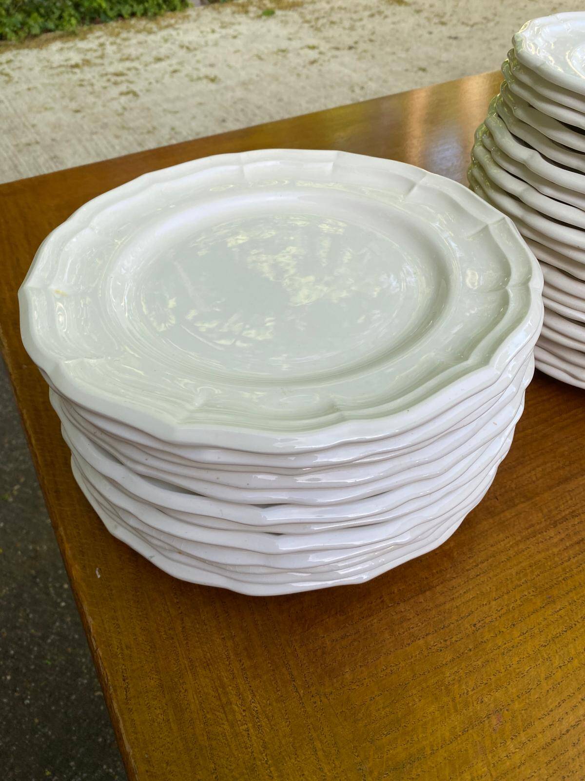 Service of 84 vintage white porcelain plates.