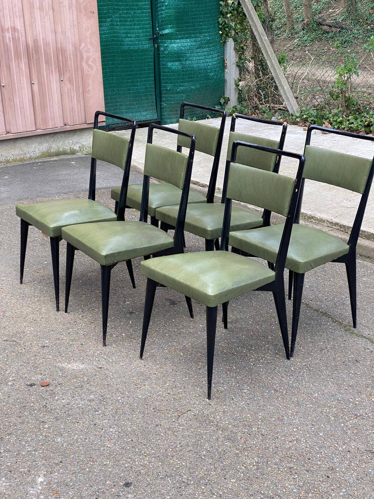 6 Italian design dining chairs in Scandinavian style with wood and olive green leather.